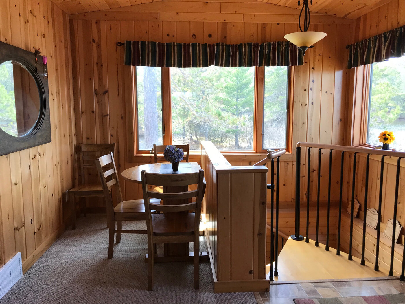Dining area with spiral staircase view